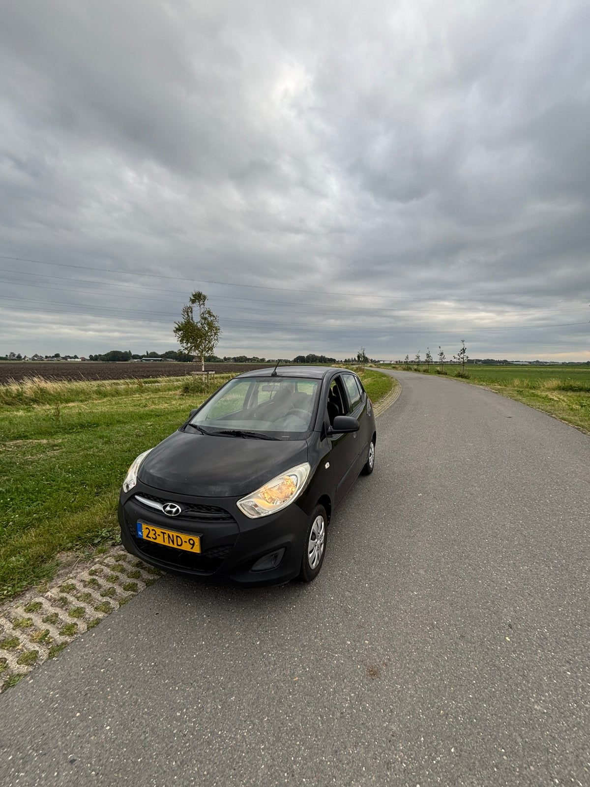 Hyundai i10 1.1 I 5DR 2012 Zwart, Stof, 400 kg, Zwart, Origineel Nederlands