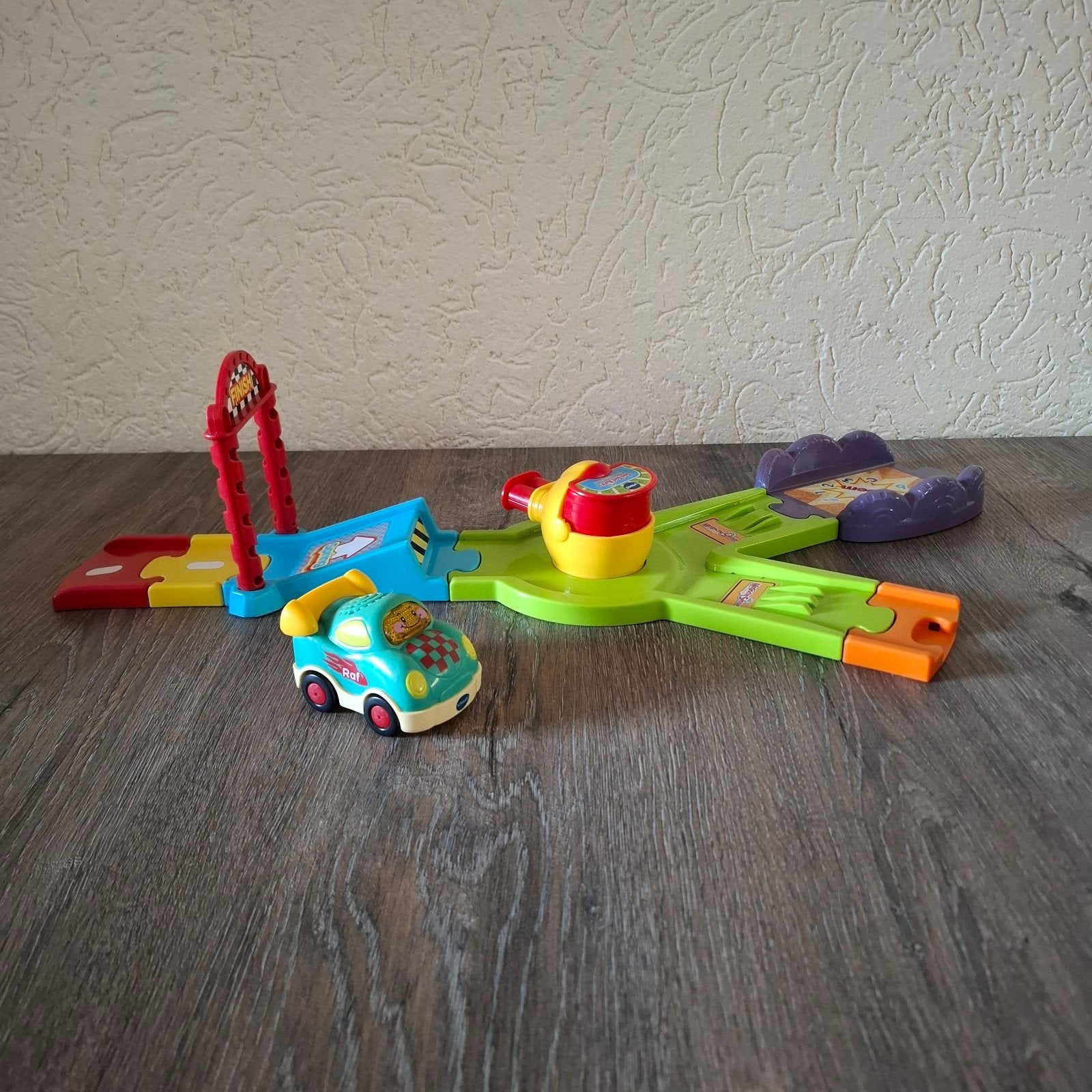 VTech Toet Toet Auto's Racebaan met Raf Raceauto, Kinderen en Baby's, Speelgoed | Vtech, Ophalen of Verzenden, Gebruikt, 6 maanden tot 2 jaar