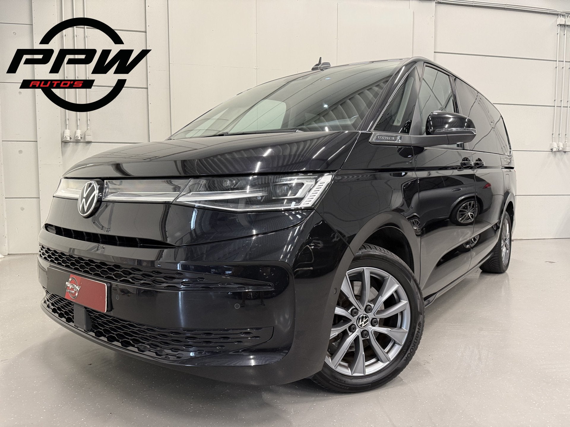 Volkswagen Multivan 1.4 eHybrid L2 Energetic 7p. PANO/SOH 94, Dealer onderhouden, Stof, Gebruikt, Zwart