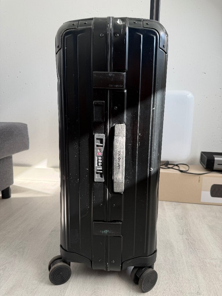 Samsonite Lite-Box Alu Spinner 69 cm Zwart – Nieuwprijs €800, Gebruikt, Hard kunststof, 45 tot 55 cm, Wieltjes