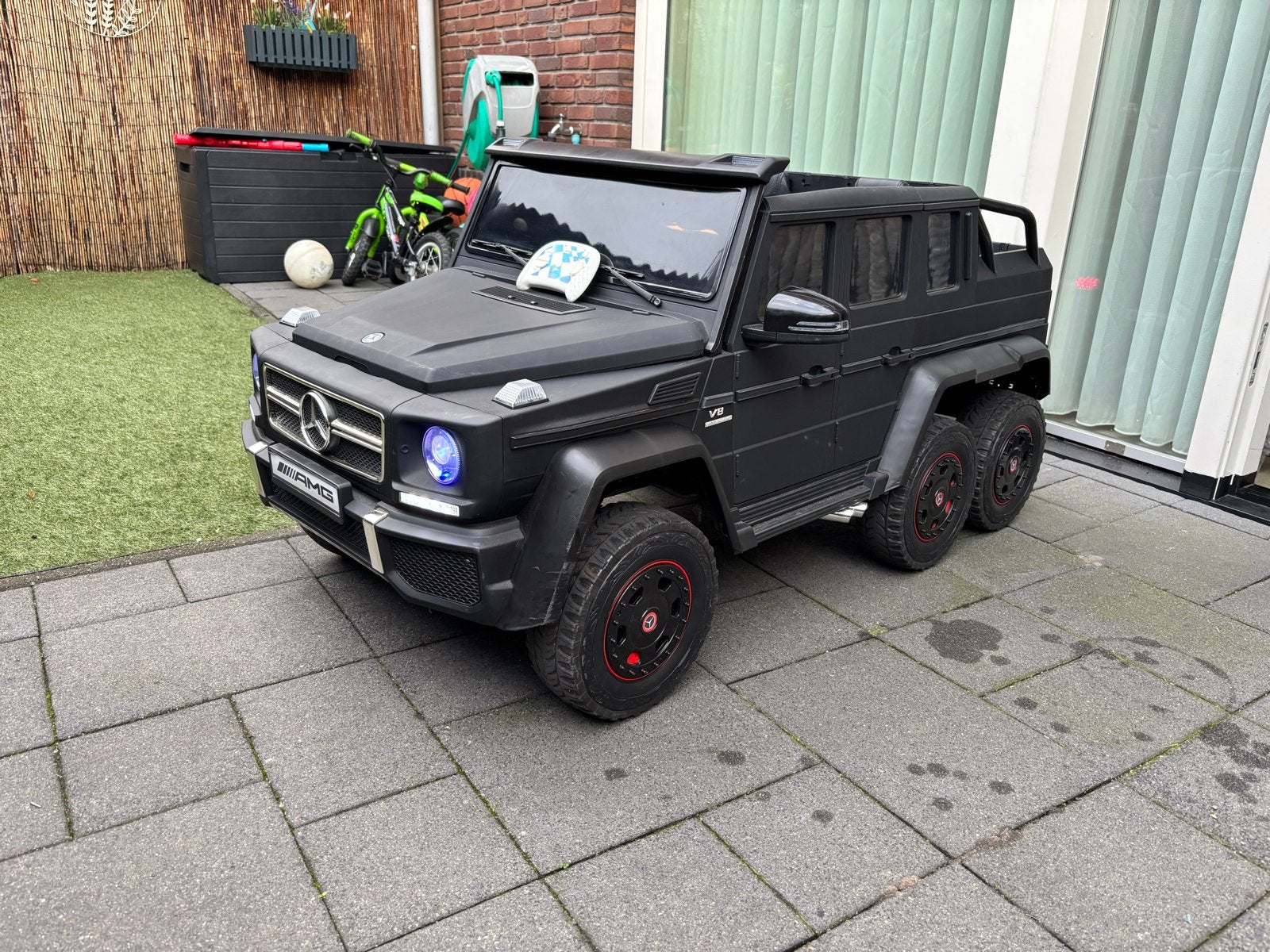 Mercedes G Klasse AMG 24V 2-persoons kinderauto, Gebruikt