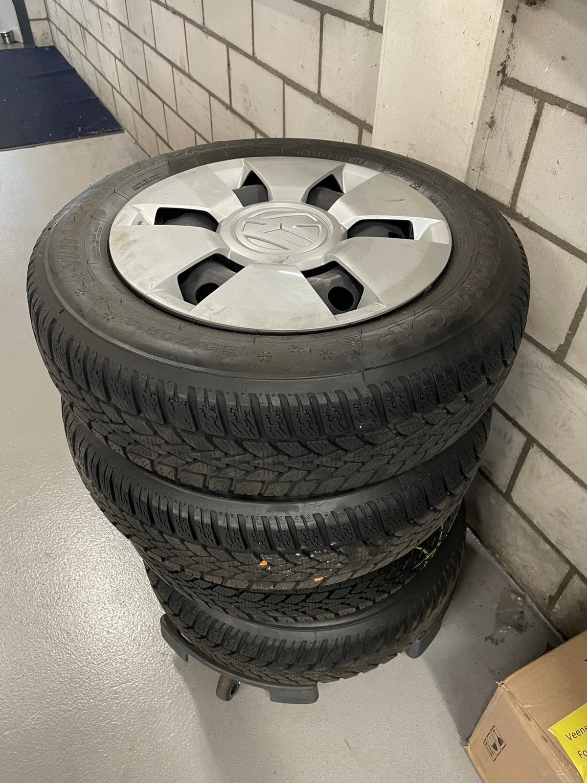 Volkswagen up seat mii winterbanden met wieldoppen, Ophalen