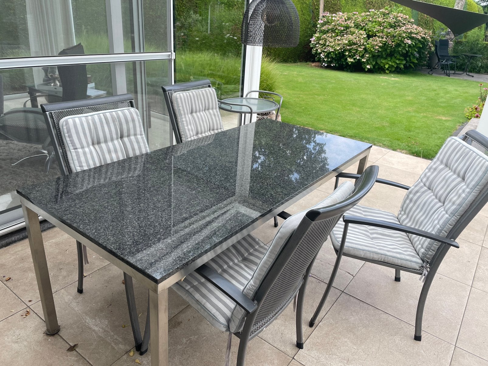 Granieten tuintafel  en 4 stoelen, Ophalen, Gebruikt, Rechthoekig, Overige materialen