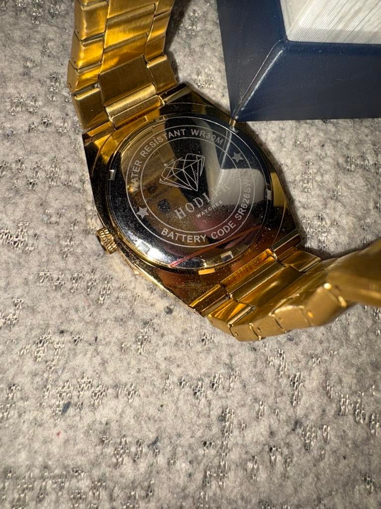 Hodler heren horloge goudkleurig, Overige merken, Overige materialen, Polshorloge, Ophalen of Verzenden