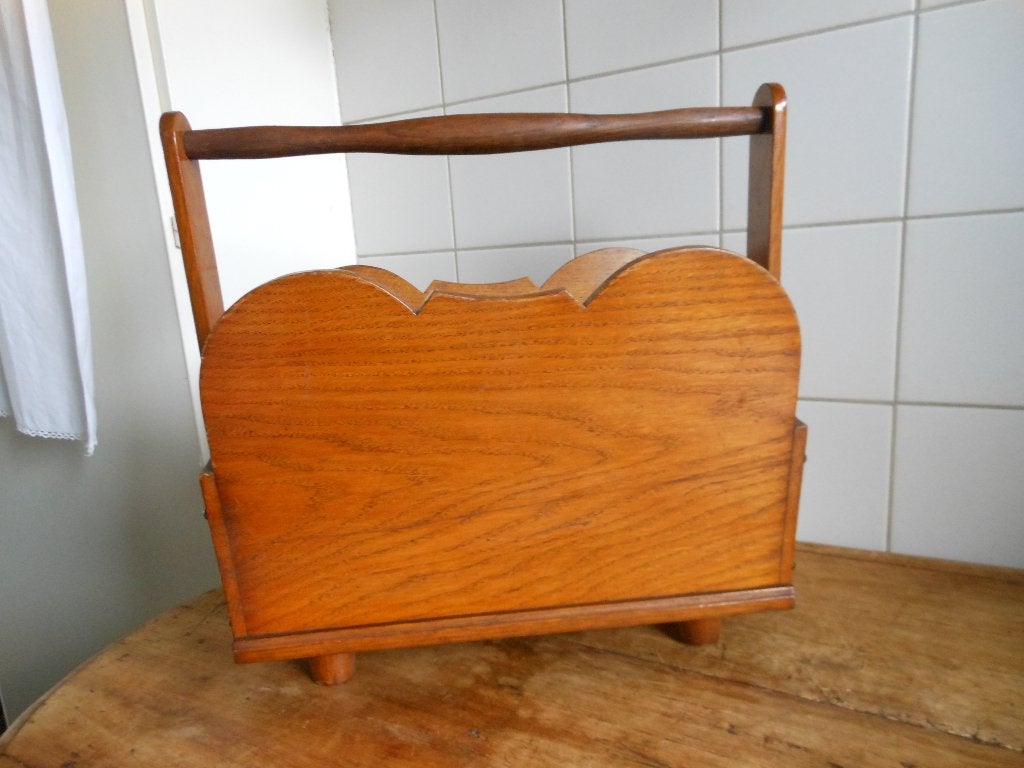 oud houten krantenbak, Ophalen