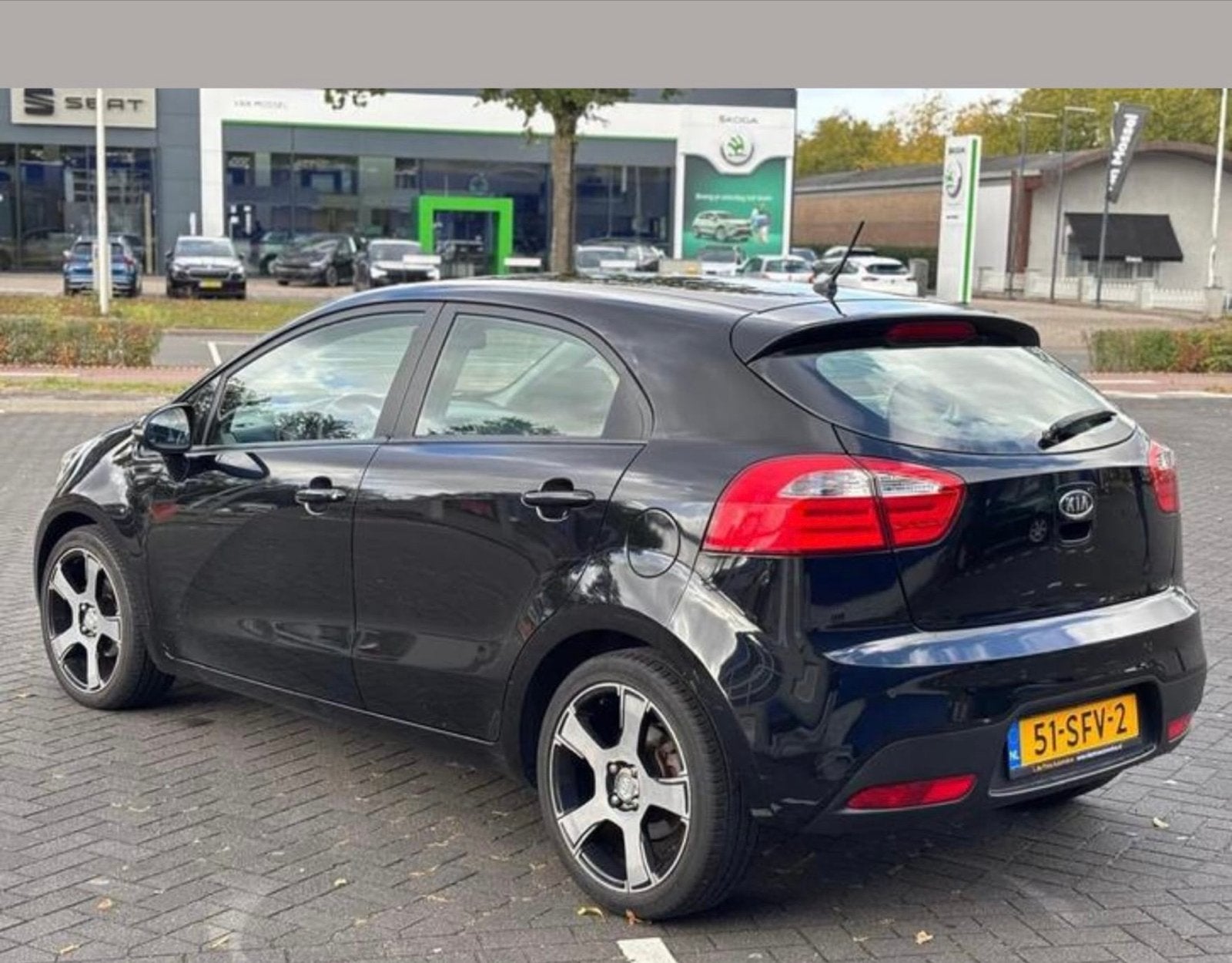 Kia Rio 1.2 I 5DRS 2011 Zwart, Auto's, 450 kg, 4 cilinders, Origineel Nederlands, Handgeschakeld