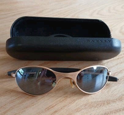 Oakley zonnebril incl hoes, Gebruikt, Zonnebril, Overige kleuren, Ophalen of Verzenden