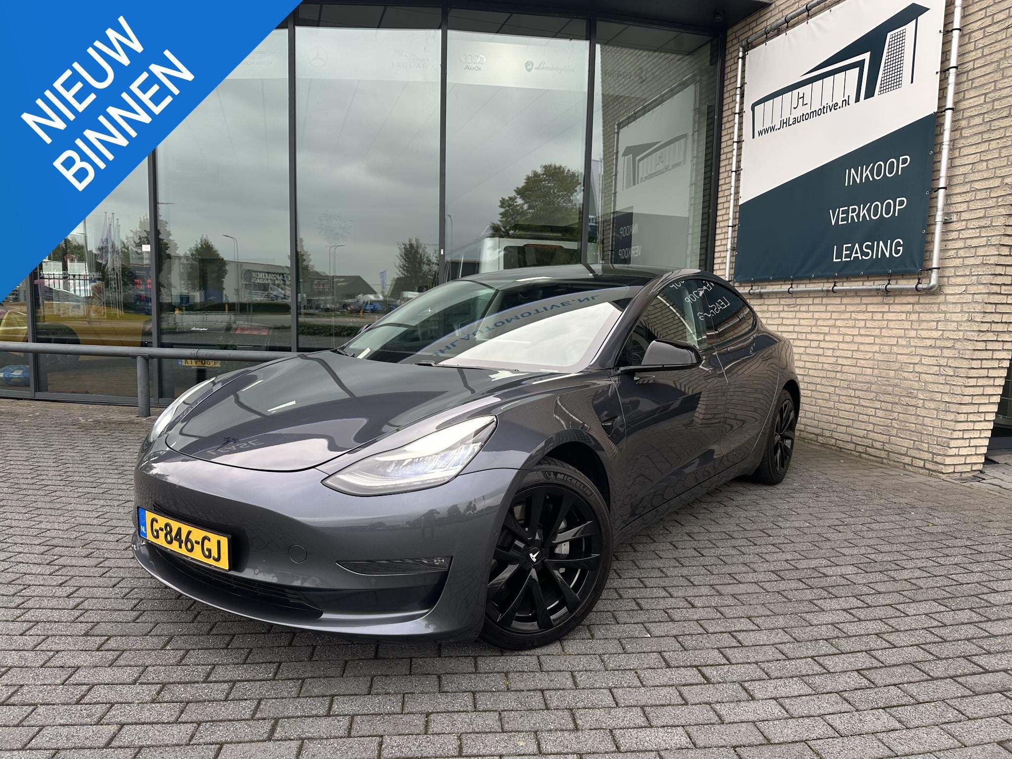 Tesla Model 3 Long Range AWD 75 kWh *TREKHAAK*SOH-84%*, Auto's, Automaat, Stof, 24 min, Origineel Nederlands