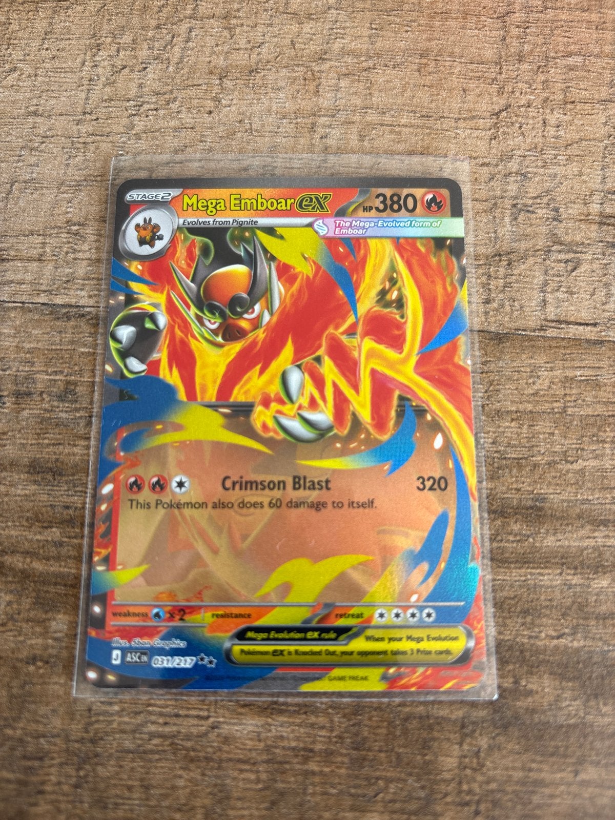 Mega Emboar EX Pokémon Kaart - Zeldzaam en Krachtig, Ophalen of Verzenden, Zo goed als nieuw, Losse kaart, Foil