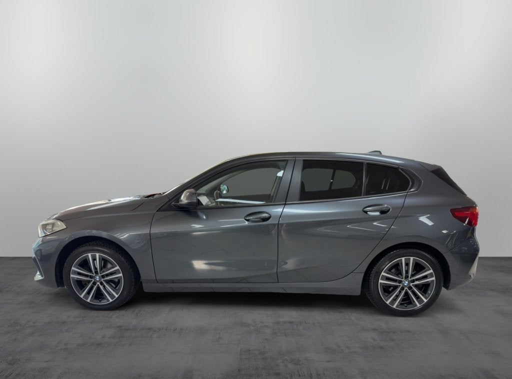 BMW 1-serie 118i High Executive Automaat Trekhaak (bj 2020), 12 maanden, Stof, Gebruikt, Origineel Nederlands