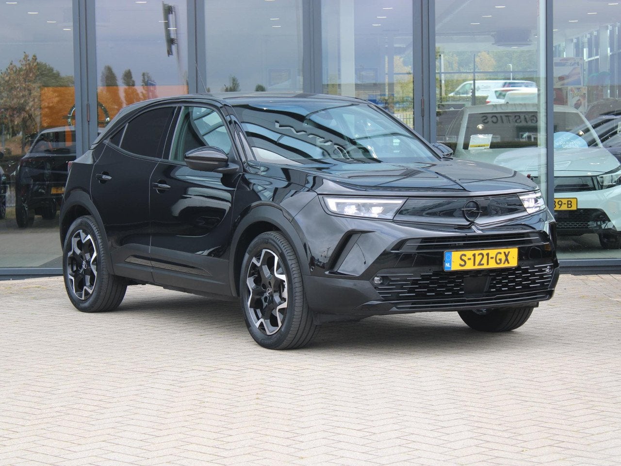 Opel Mokka-e Ultimate 50-kWh 11kw bl. | Trekhaak / Camera /, Auto's, Opel, Automaat, 136 pk, Gebruikt, Mokka-e