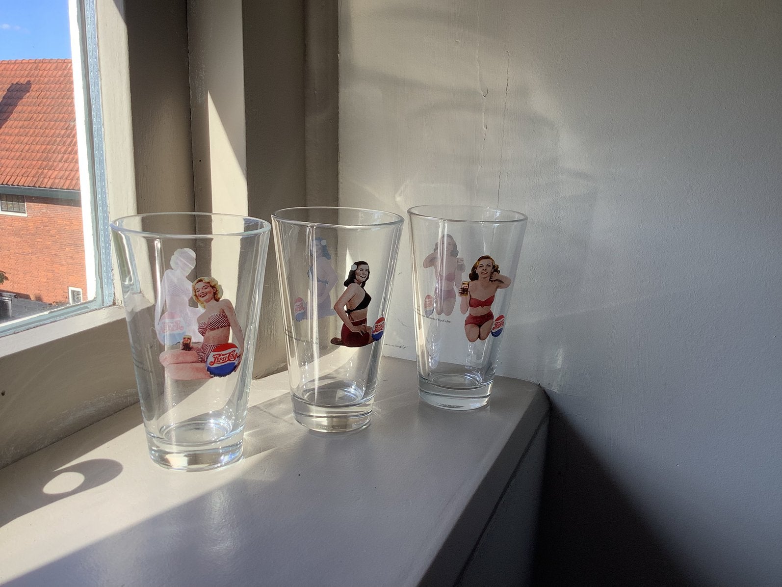 Pepsi Cola glazen met pin up, Verzamelen, Ophalen of Verzenden, Zo goed als nieuw, Frisdrankglas