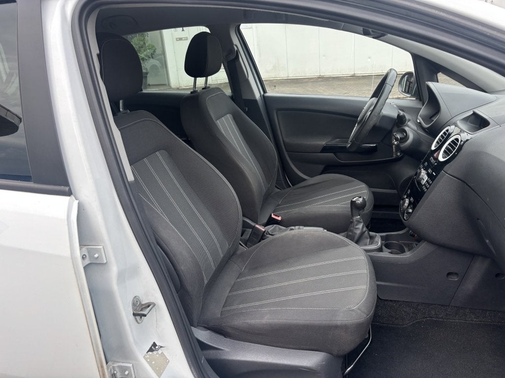 Opel Corsa 1.2-16V Anniversary Edition Airco Cruise, Euro 5, Gebruikt, 4 cilinders, 1229 cc