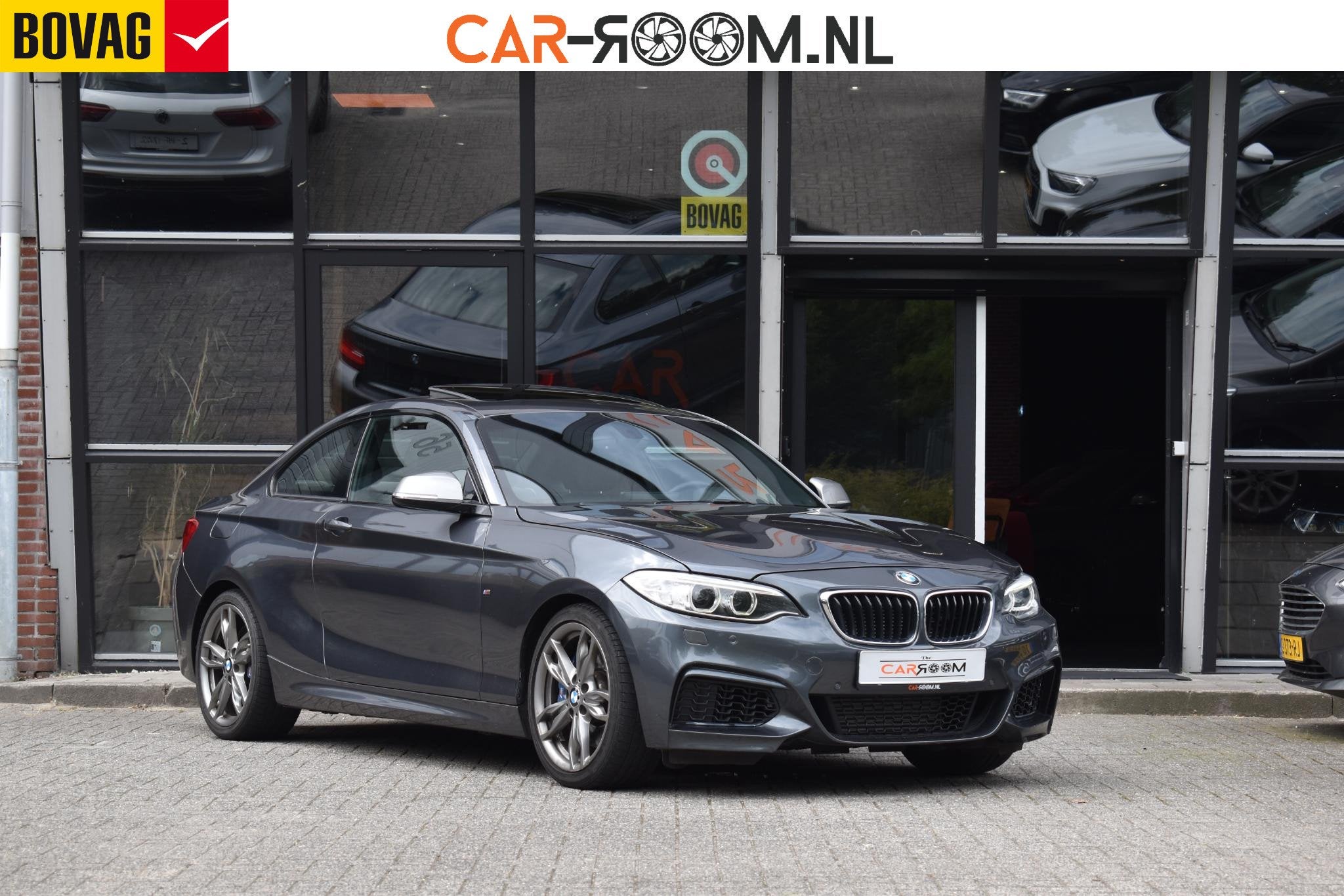 BMW 2-serie Coupé M235i High Executive Keyless Pano H/K Cam, Dealer onderhouden, Achterwielaandrijving, Gebruikt, Met garantie (alle)