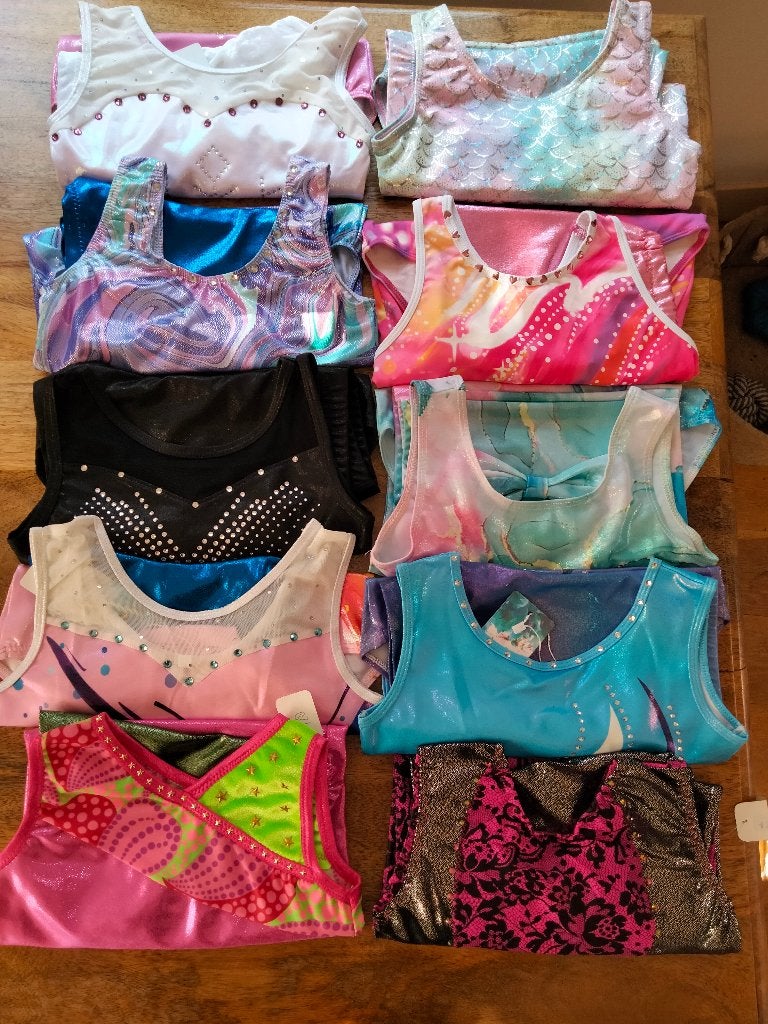 Turnpakje/ turnpakjes maat 128 SALE nu 9,50 per setje (2), Kindermaat 122 t/m 140, Ophalen of Verzenden, Nieuw, Turnpak(je)