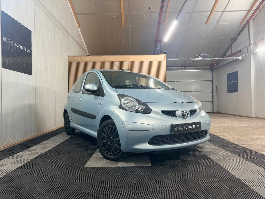 Toyota Aygo 1.0-12V + | Airco | 5drs | NAP | APK 01-2027, Auto's, Toyota, Voorwielaandrijving, Stof, Gebruikt, Zwart