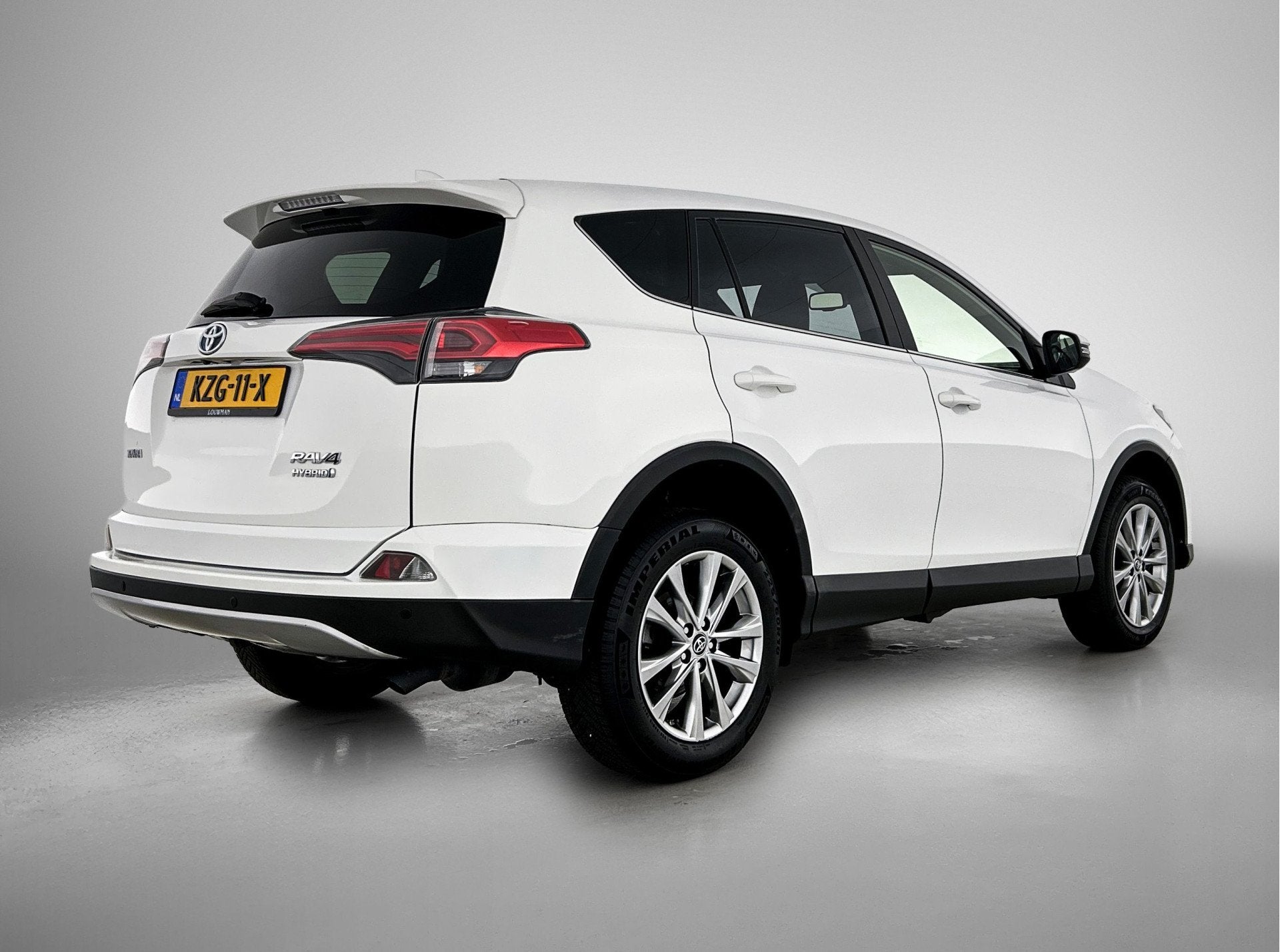 Toyota RAV4 2.5 Hybrid Executive (bj 2018, automaat), Auto's, Wit, Leder, Bedrijf, 155 pk