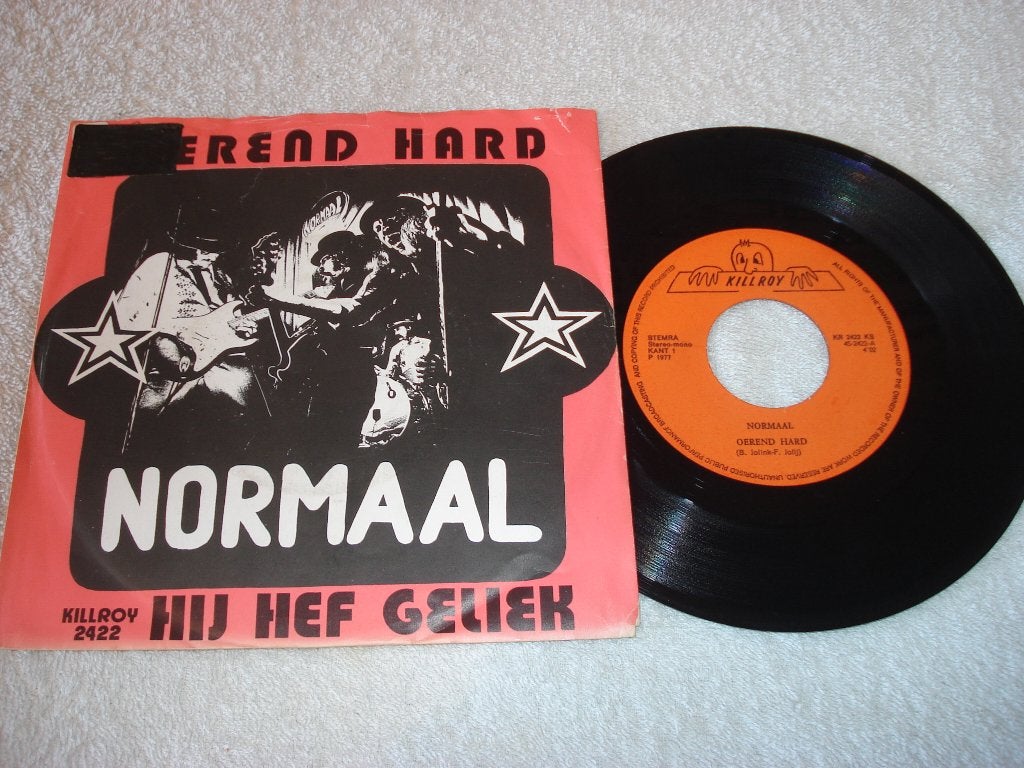 Normaal     Oerend Hard     Orgineel, Fotohoes, Ophalen of Verzenden, Zo goed als nieuw, Nederlandstalig