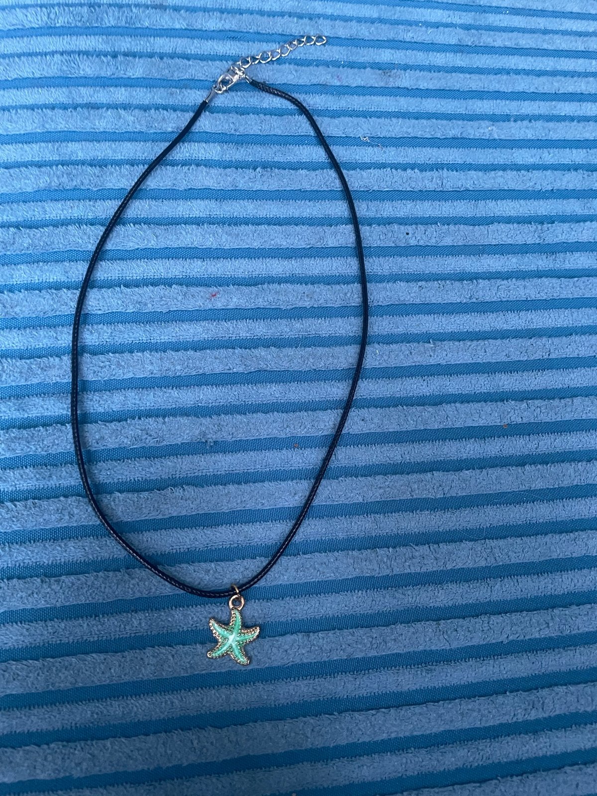 Zwarte ketting met Zeester hanger, Overige kleuren, Nieuw, Ophalen of Verzenden, Overige materialen