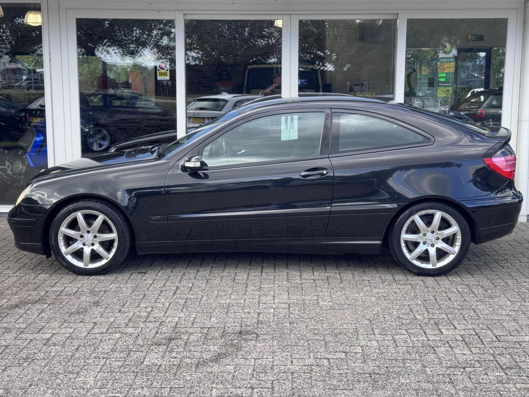 Mercedes C-klasse Sportcoupé 200 Kompressor 163pk 6bak,Clim, Auto's, 1998 cc, Gebruikt, Zwart, 4 cilinders