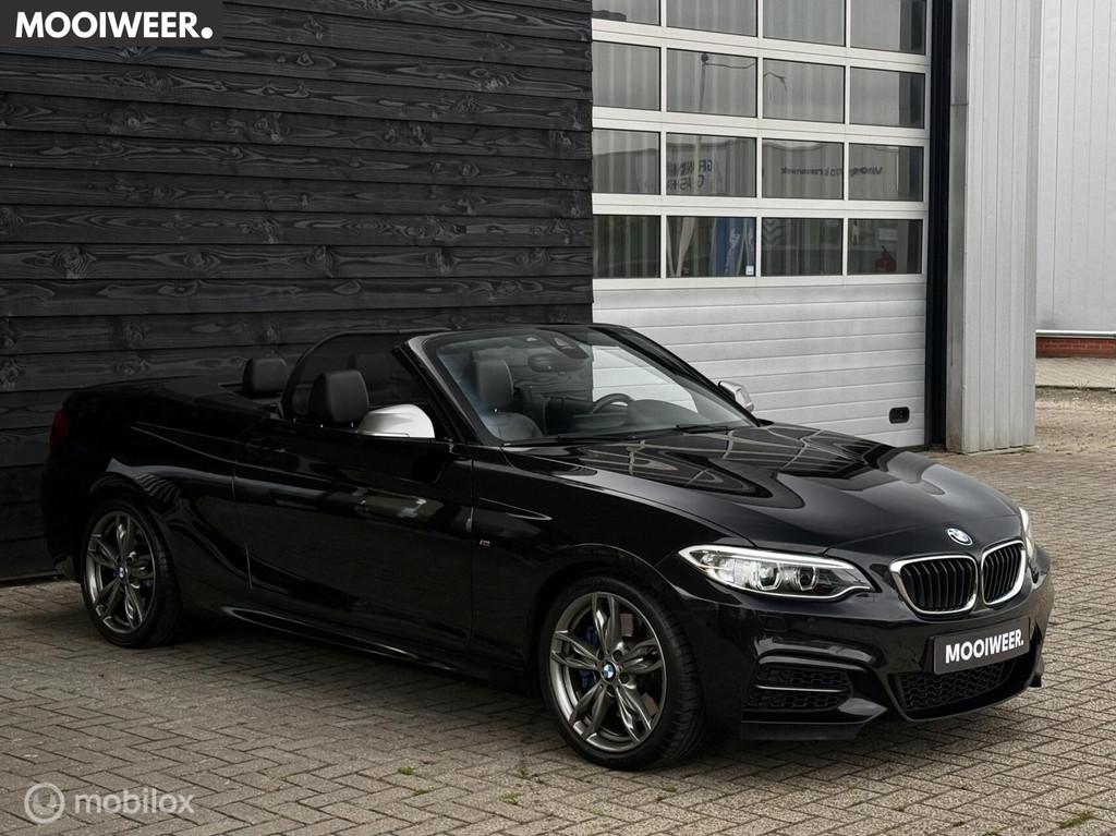BMW 2-serie Cabrio M235i High Executive | Leder | 326 PK, Auto's, BMW, Achterwielaandrijving, Gebruikt, 1595 kg, Cabriolet