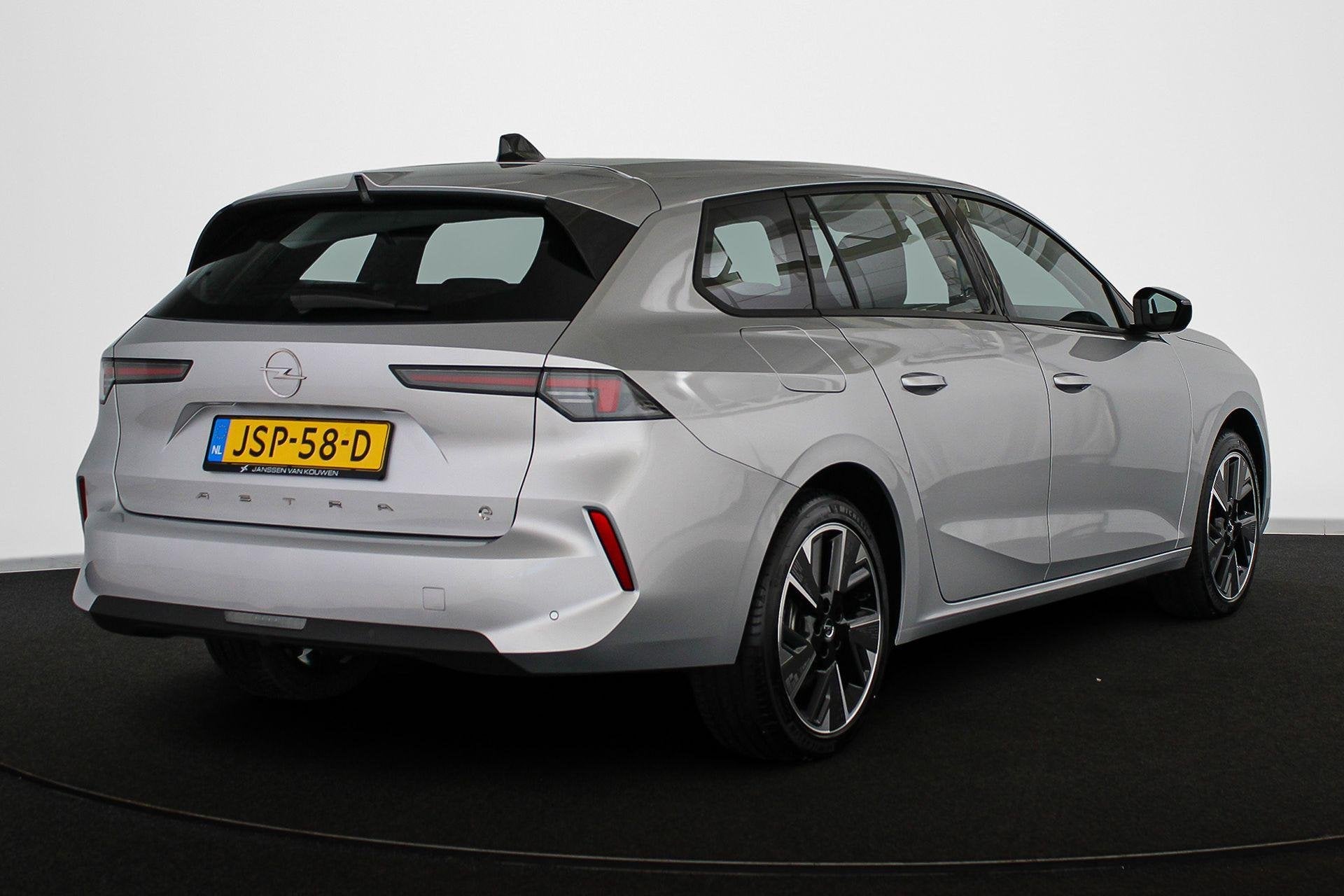 Opel Astra Sports Tourer Electric 54 kWh Edition Apple CarPl, Auto's, Stof, Gebruikt, 156 pk, Origineel Nederlands