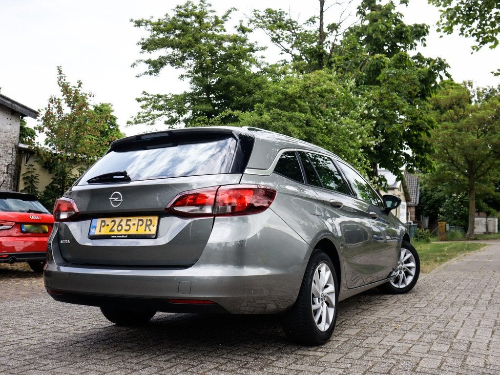 Opel Astra Sports Tourer 1.2 Business Elegance 1e-Eig. & Keu, Auto's, Opel, Voorwielaandrijving, 12 maanden, Gebruikt, 1199 cc