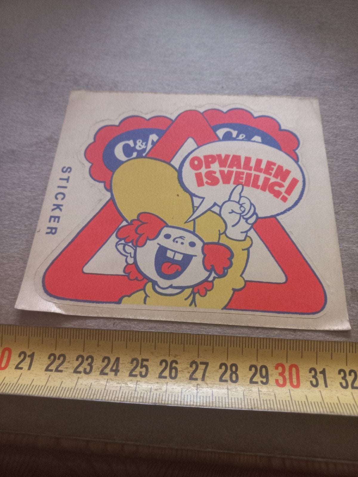Vintage C&A Sticker: Opvallen is Veilig!, Verzamelen, Ophalen of Verzenden, Gebruikt, Merk