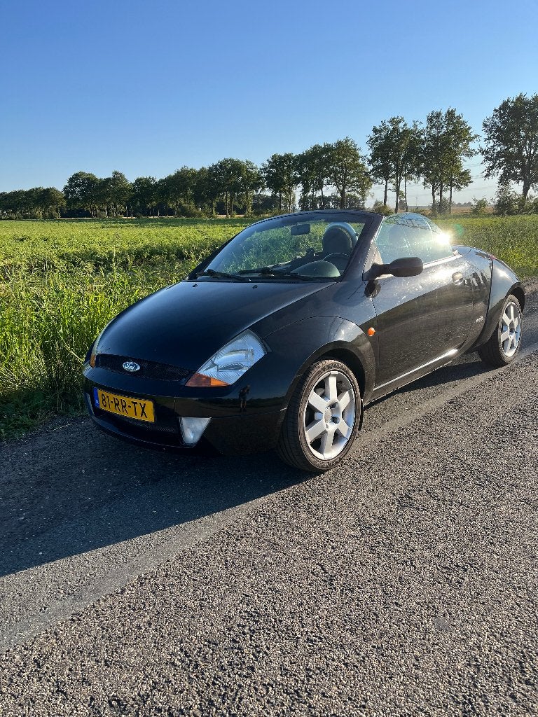 Ford Ka 1.6 Streetka 2005 Zwart, 40 €/maand, Zwart, Origineel Nederlands, Handgeschakeld