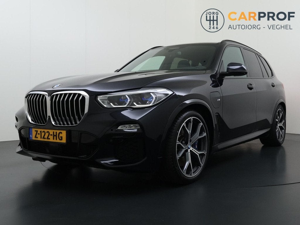BMW X5 xDrive45e High Executive M Pakket Trekhaak Laser HUD, Auto's, BMW, Gebruikt, 394 pk, Zwart, Vierwielaandrijving