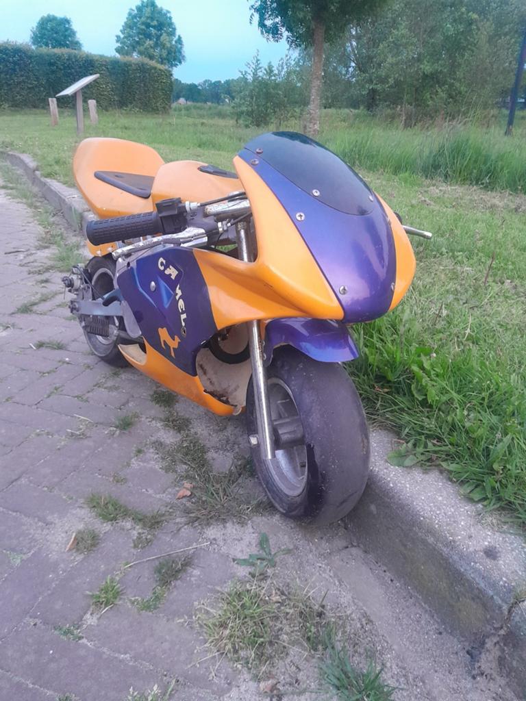 Stoere oranje/paarse pocketbike - Perfect voor de hobbyist!, Gebruikt, Onbekend, Ophalen of Verzenden, Pitbike