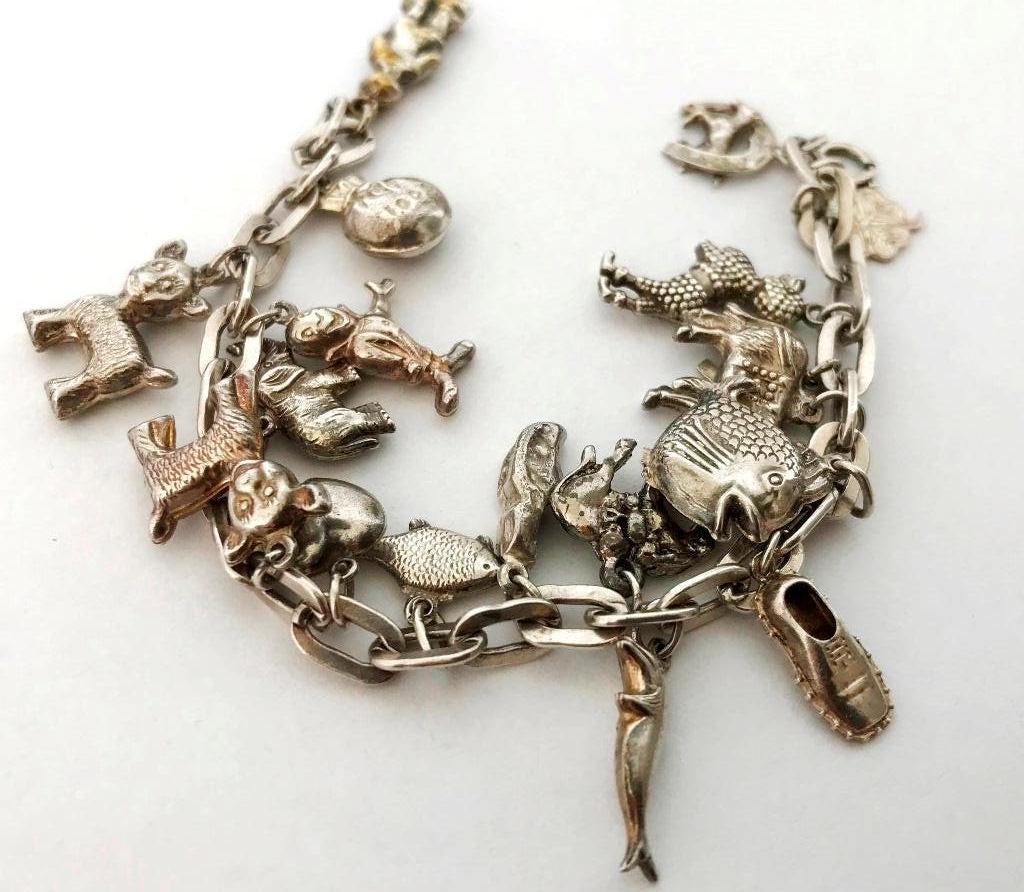 Mooie zilveren Armband met veel prachtige Bedels, Sieraden, Tassen en Uiterlijk, Antieke sieraden, Ophalen, Zilver, Armband