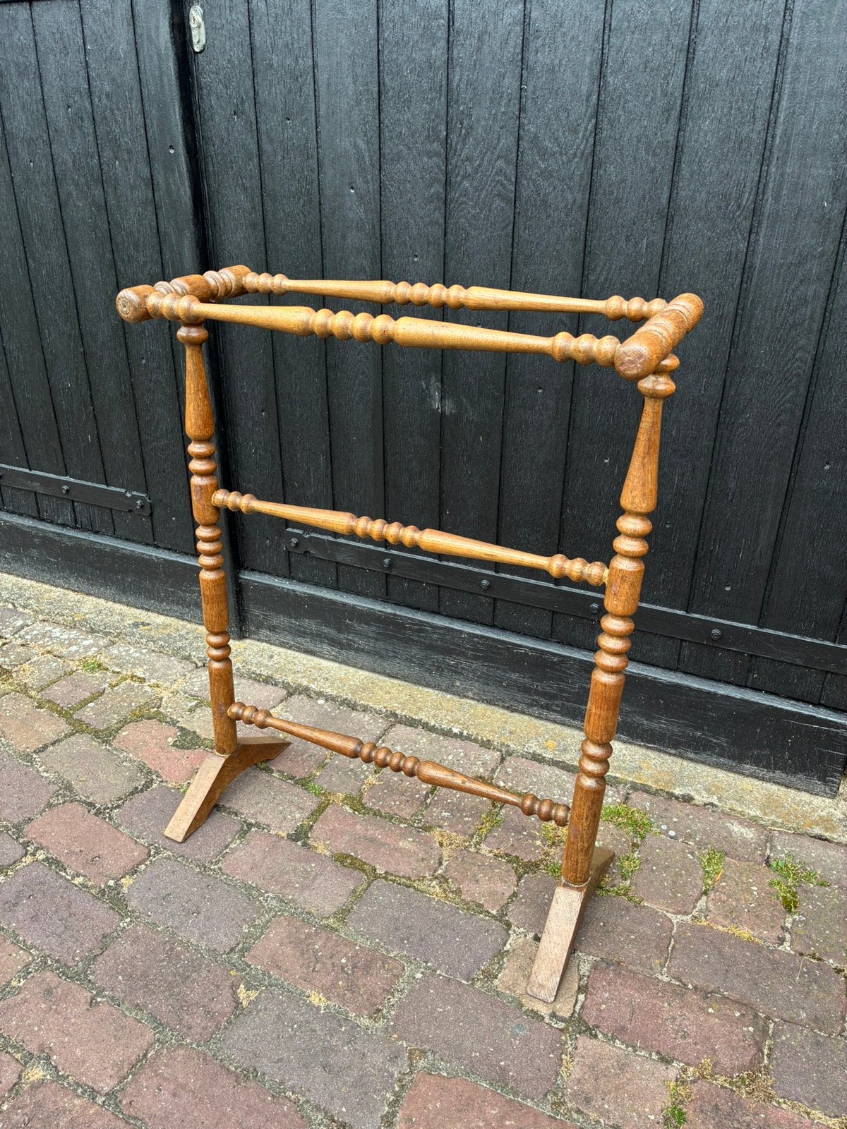 Oud houten handdoekenrek, Ophalen