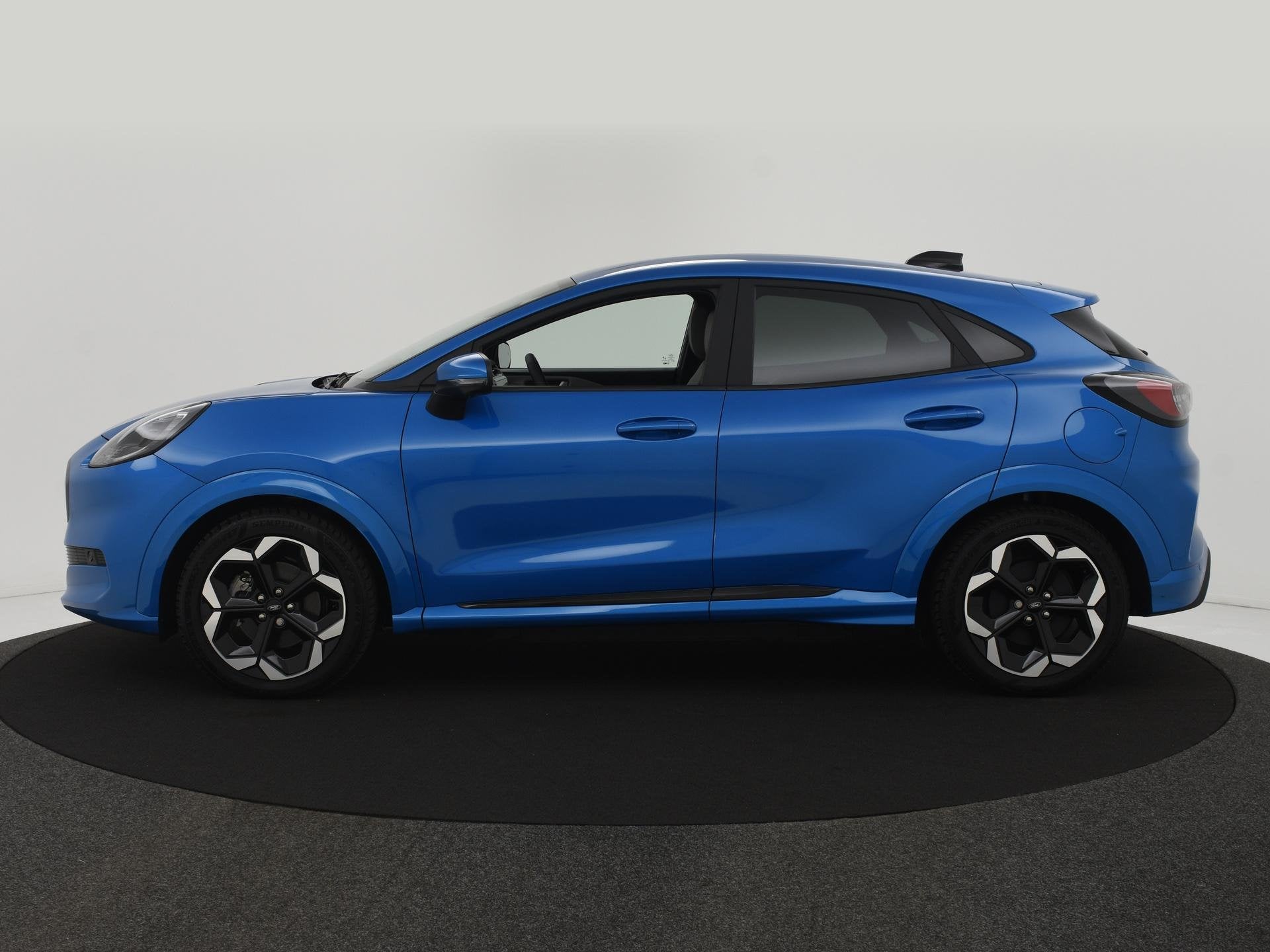 Ford Puma Gen-E Premium 44 kWh WINTERPACK|ACC|BLIS|360CAMERA, Auto's, 750 kg, 23 min, Blauw, Leder en Stof