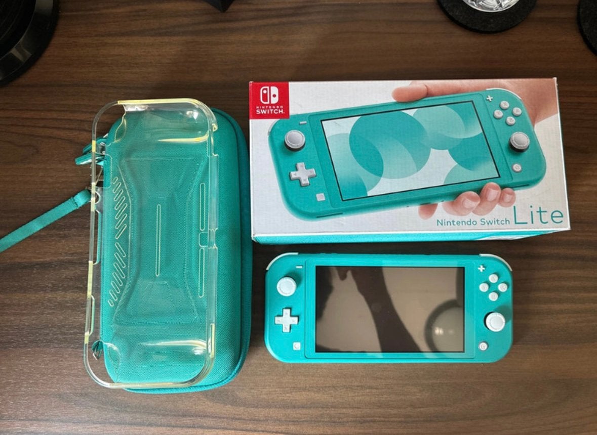 Nintendo Switch Lite bundel, Spelcomputers en Games, Spelcomputers | Nintendo Switch Lite, Ophalen of Verzenden, Turquoise, Zo goed als nieuw