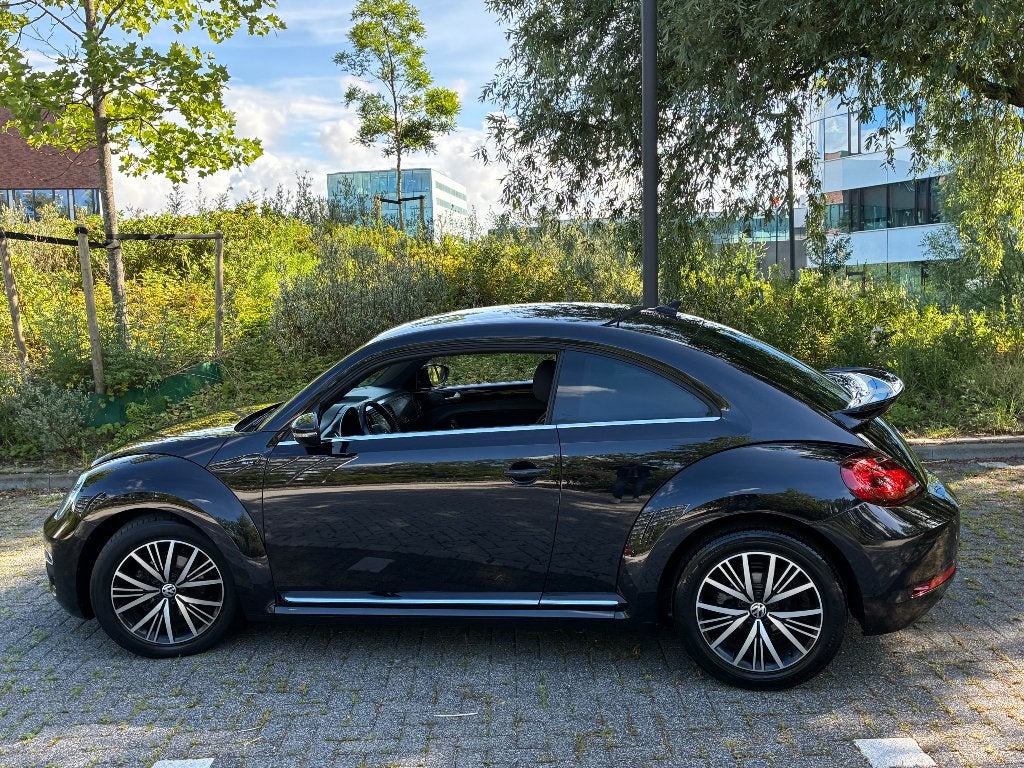 Volkswagen Beetle (Kever) 1.2 TSI 77KW BMT 2016 Zwart, Auto's, Volkswagen, Voorwielaandrijving, 4 cilinders, 4 stoelen, Leder en Stof
