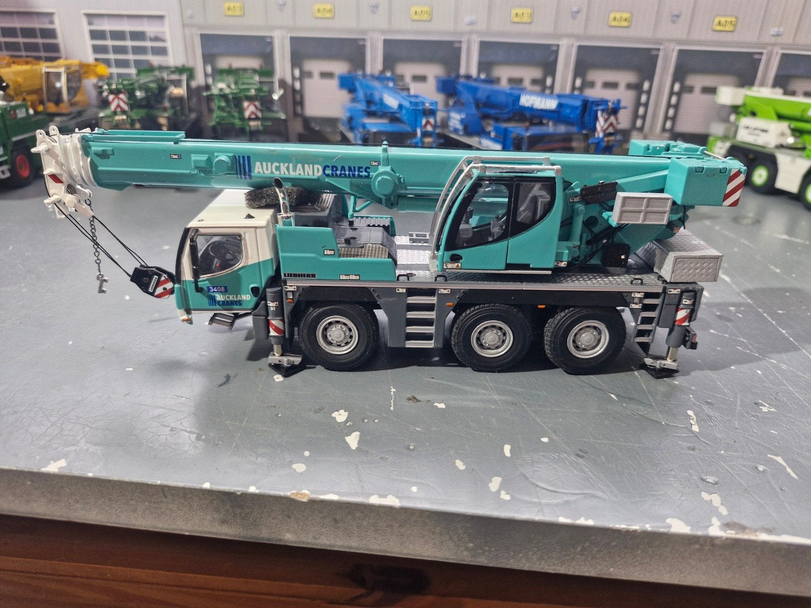 Liebherr ltm 1050 wsi auckland cranes, Hobby en Vrije tijd, Modelauto's | 1:50, Ophalen of Verzenden, Zo goed als nieuw, Hijskraan, Tractor of Landbouw