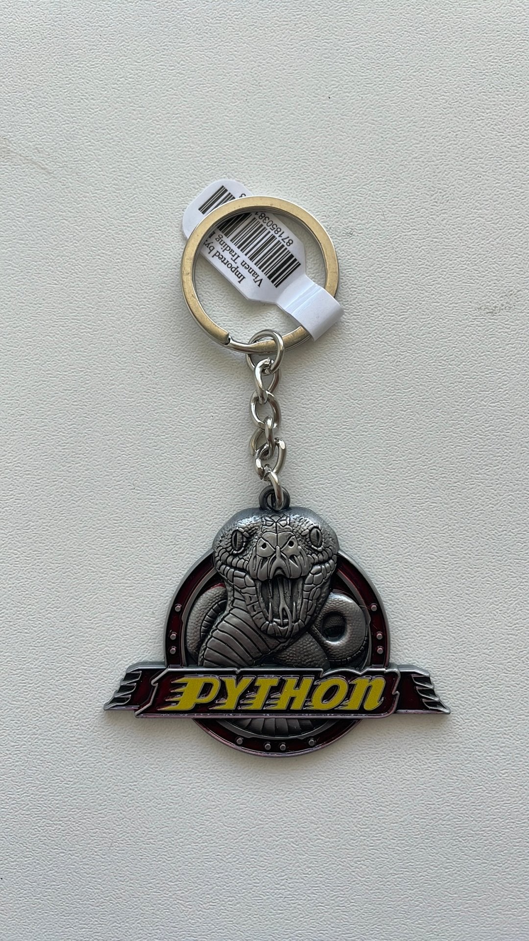 Efteling sleutelhanger Python, Verzenden, Zo goed als nieuw, Button of Speldje