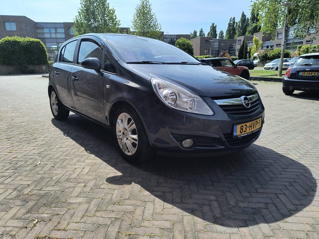 Opel Corsa 1.4 16V 5D 2009 Grijs, Voorwielaandrijving, Stuurwielverwarming, 1063 kg, Zwart