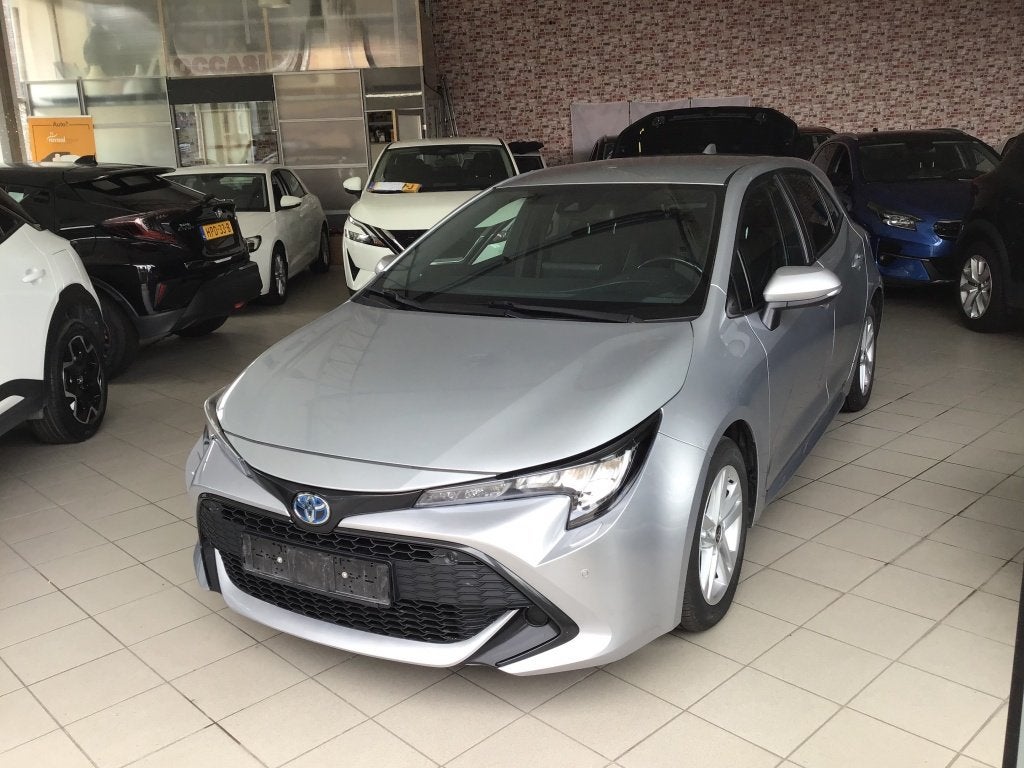 Toyota Corolla 1.8 Hybrid Active (bj 2022, automaat), Auto's, Automaat, 450 kg, Gebruikt, 4 cilinders