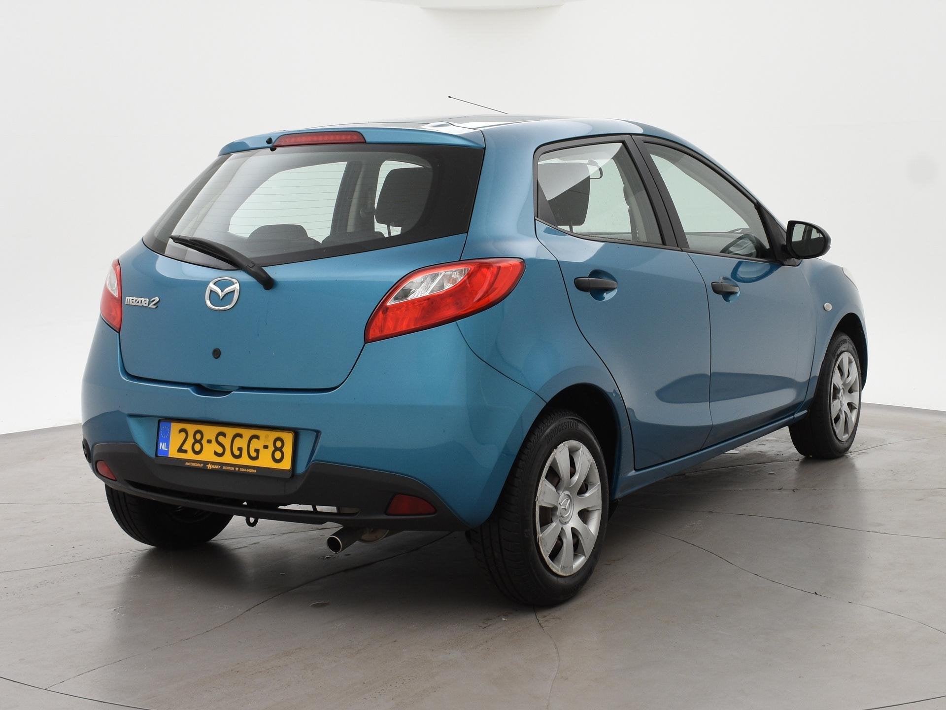 Mazda 2 1.3 BIFUEL LPG VANAF FABRIEK COOL + AIRCO | ARMSTEUN, Auto's, Mazda, Voorwielaandrijving, Euro 5, Stof, Gebruikt