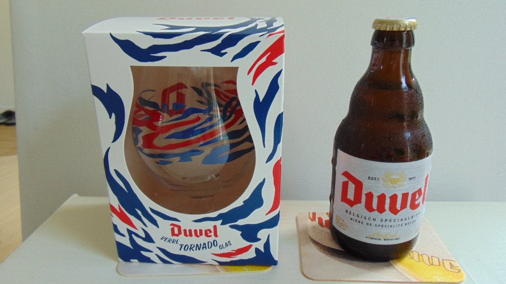 Duvel glas Tornado + een Duvel met viltjes, Ophalen of Verzenden, Zo goed als nieuw, Glas of Glazen, Duvel