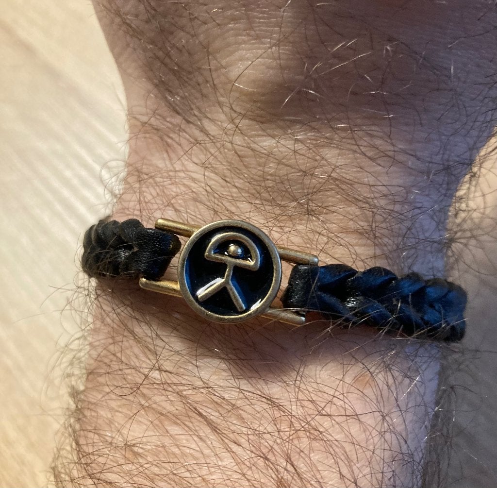 Armbandje zwart leer met Indalo teken, Ophalen of Verzenden, Zo goed als nieuw, Zwart, Leer