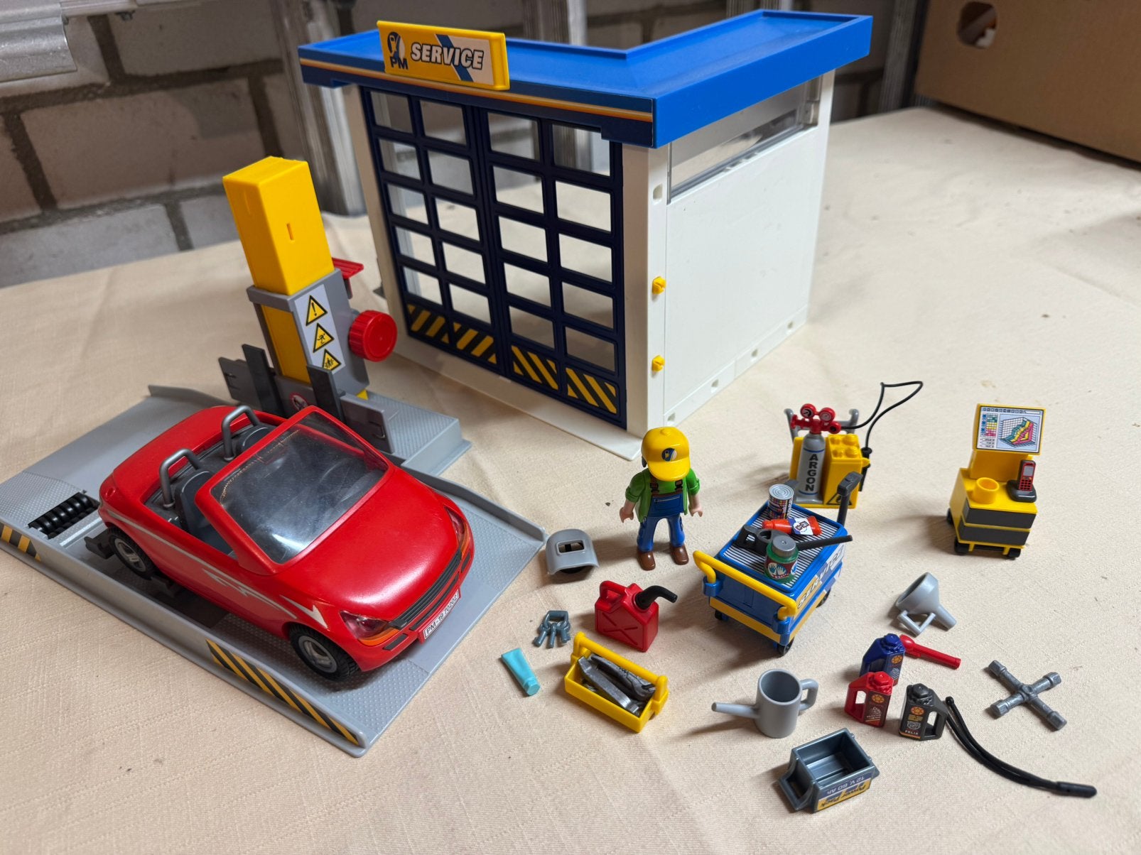 Playmobil garage met toebehoren en auto, Ophalen of Verzenden, Gebruikt, Jongen of Meisje