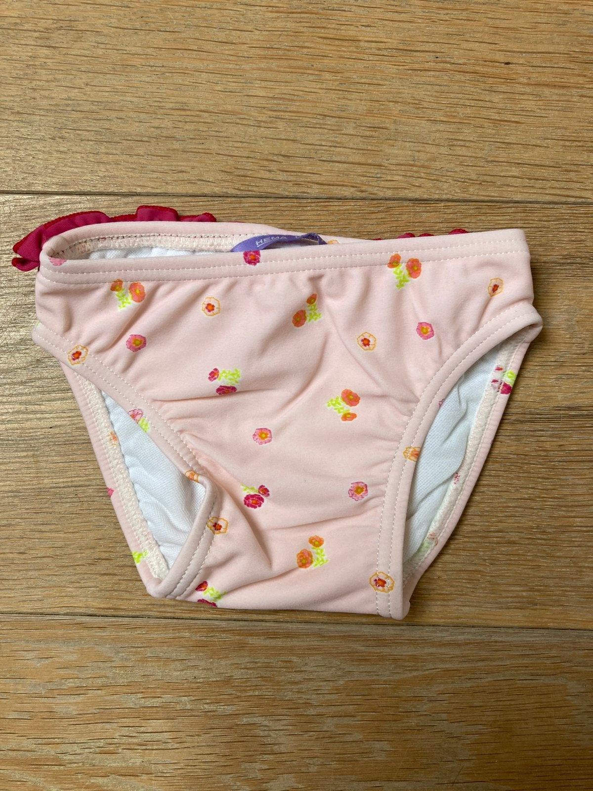 Roze Bikinibroekje met Bloemen maat 68-74 zgan, Meisje, Bikinibroekje, Ophalen of Verzenden, Zo goed als nieuw
