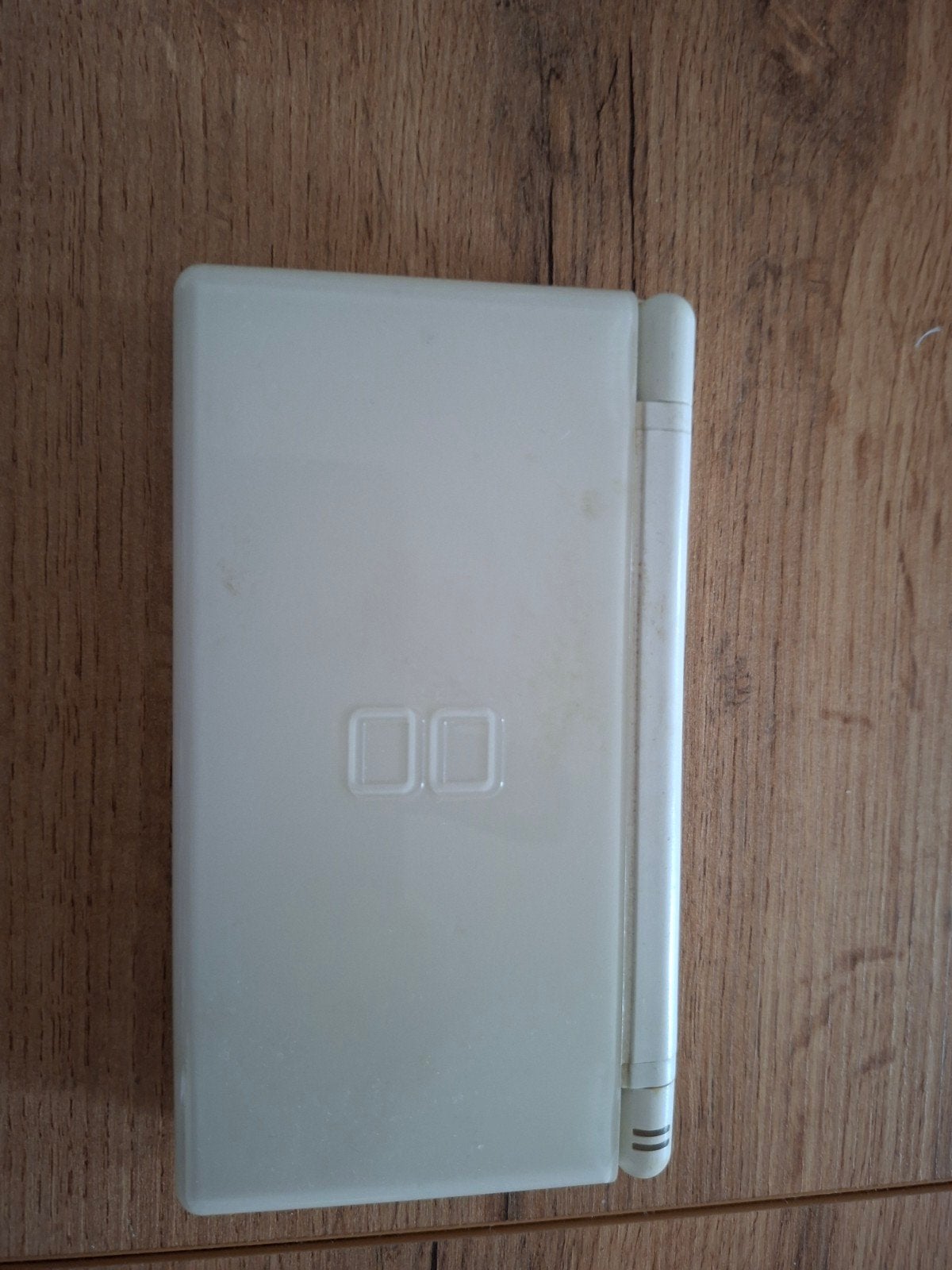 Oude Nintendo DS Lite met spellen, Spelcomputers en Games, Spelcomputers | Nintendo DS, Met games, Wit, Ophalen of Verzenden, Niet werkend