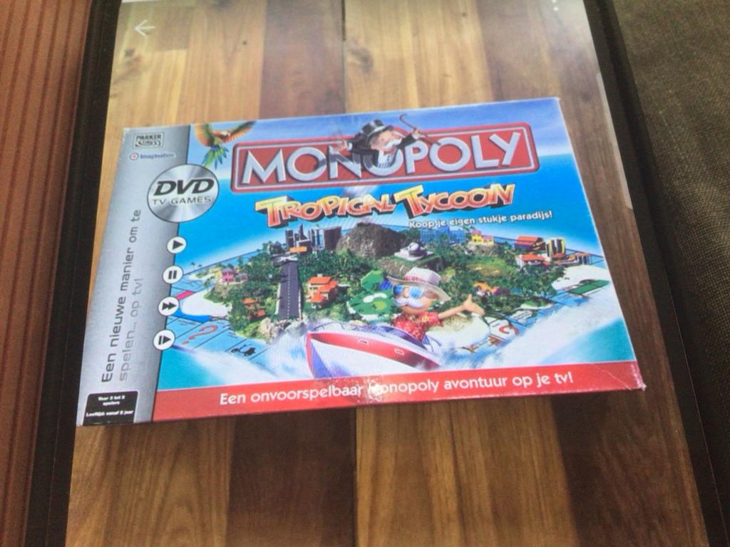Monopoly Tropical Tycoon DVD TV Games, Hobby en Vrije tijd, Gezelschapsspellen | Bordspellen, Drie of vier spelers, Ophalen of Verzenden
