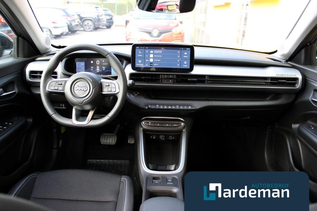 Jeep Avenger Altitude 54 kWh Carplay Camera, Auto's, Jeep, 394 km, Gebruikt, Leder en Stof, SUV of Terreinwagen
