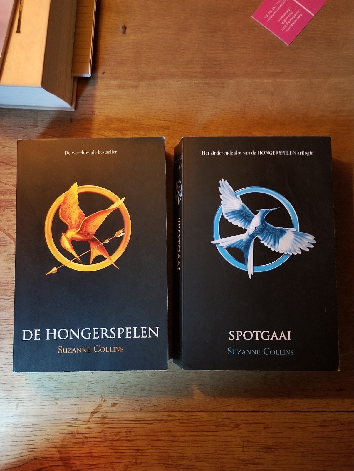 Suzanne Collins - De Hongerspelen/Suzanne Collins - spotgaai, Boeken, Suzanne Collins, Ophalen of Verzenden, Zo goed als nieuw