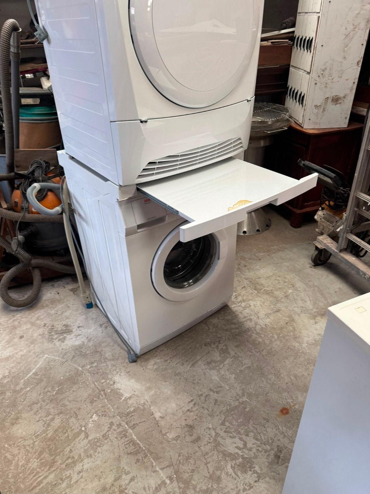 Tussenstuk of stapelkit wasmachine/droger, Ophalen, Zo goed als nieuw